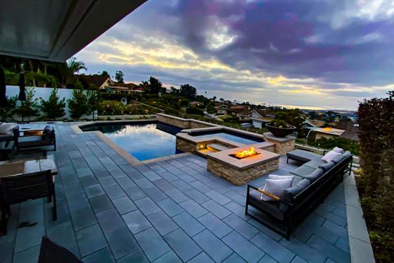 Cantilevered outdoor ceiling with heat elements, fans, and built in speakers overlooking San Clemente